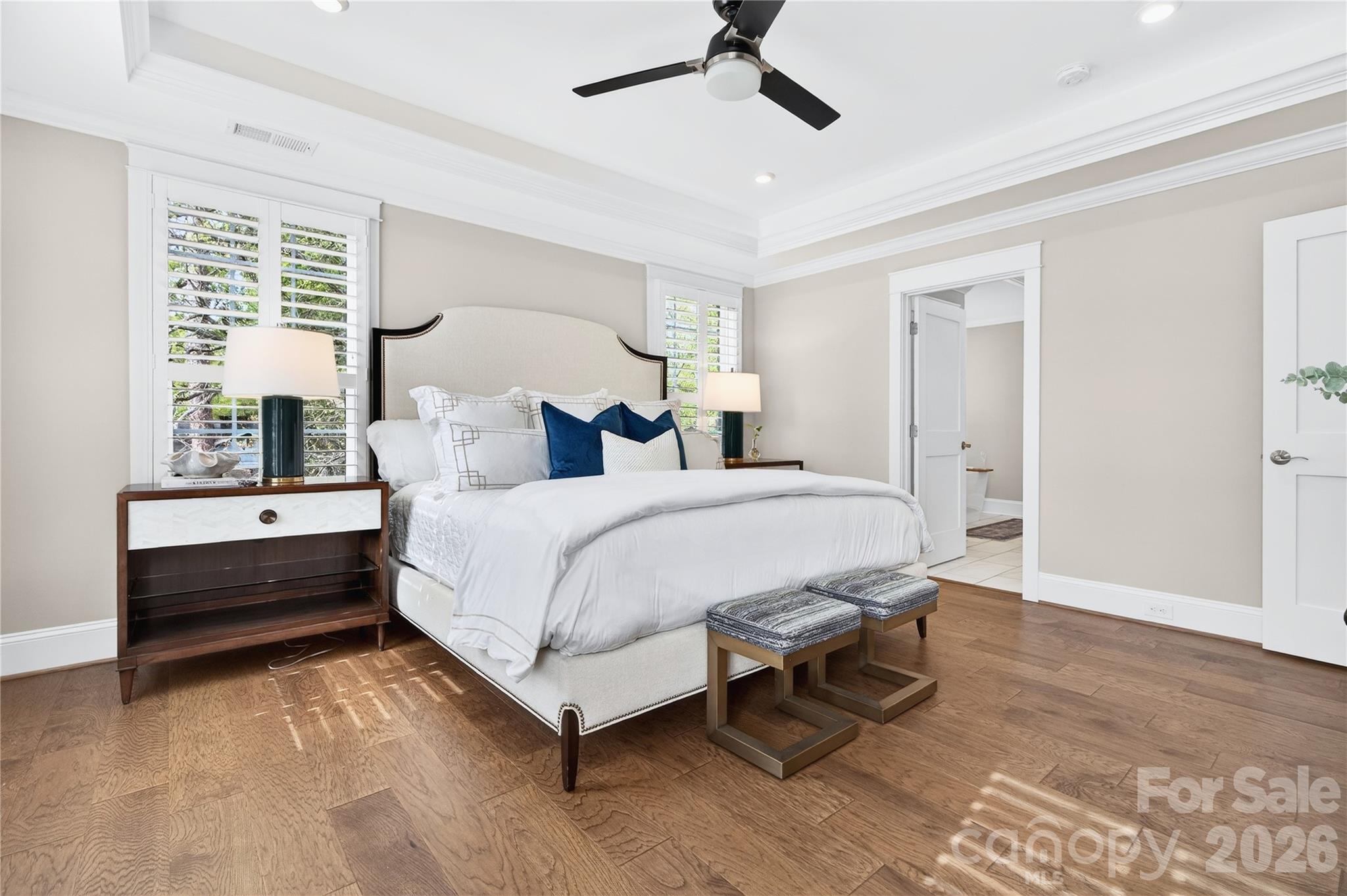 489 South Main Street Davidson, NC 28036 - Photo 22 of 43 a bedroom with a bed and large window