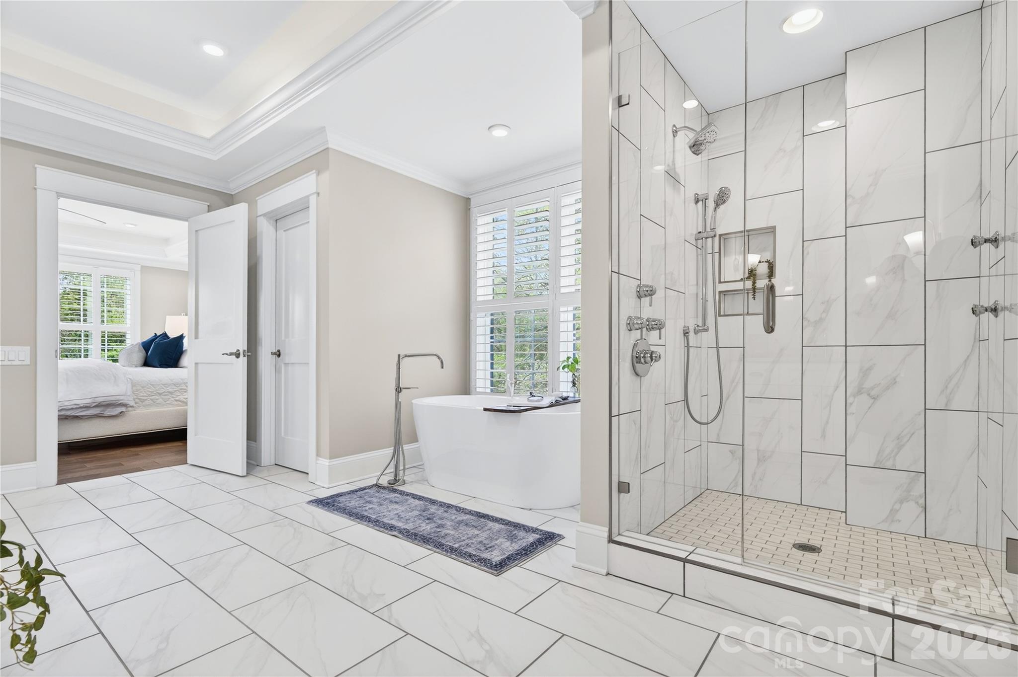 489 South Main Street Davidson, NC 28036 - Photo 25 of 43 a en suite bathroom with a shower and a sink