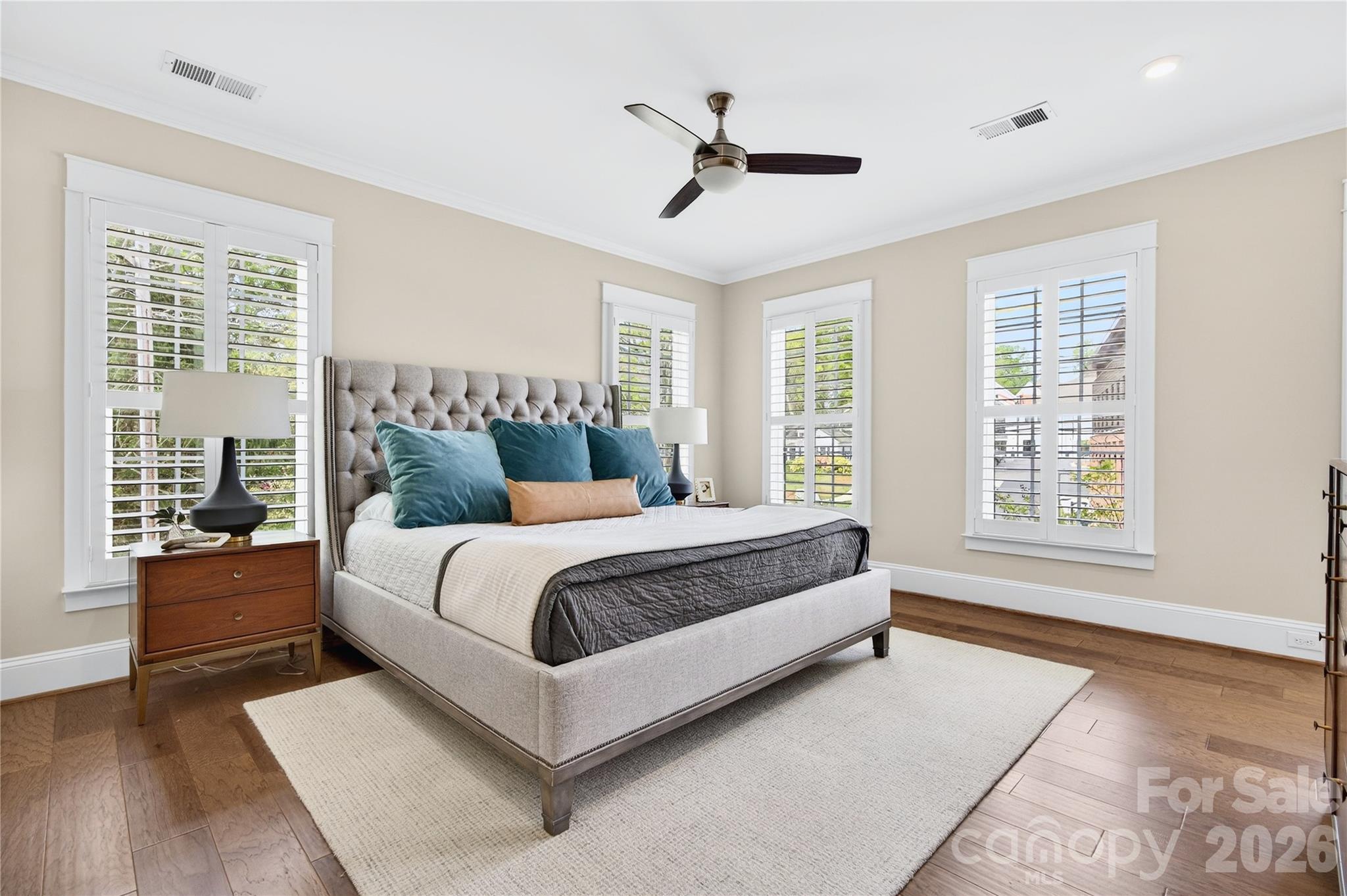 489 South Main Street Davidson, NC 28036 - Photo 27 of 43 a bedroom with a large bed and a large window
