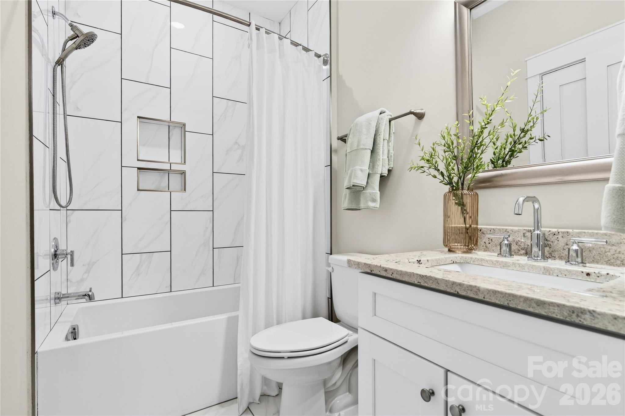 489 South Main Street Davidson, NC 28036 - Photo 35 of 43 a bathroom with a granite countertop sink toilet and shower