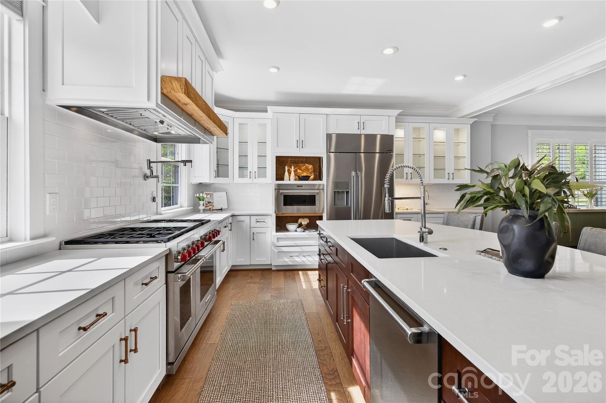 489 South Main Street Davidson, NC 28036 - Photo 10 of 43 a kitchen that has a sink and a stove