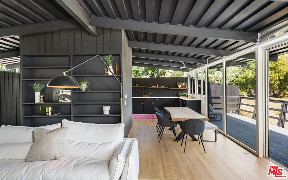 6009 Bonsall Drive Malibu, CA 90265 - Photo 12 of 49 a bedroom with furniture and a wooden floor