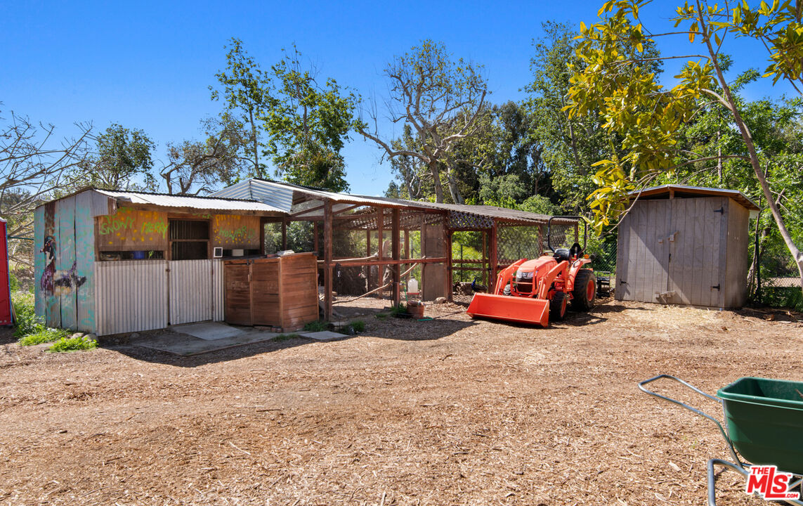 6009 Bonsall Drive Malibu, CA 90265 - Photo 29 of 49 a view of a car park in front of house