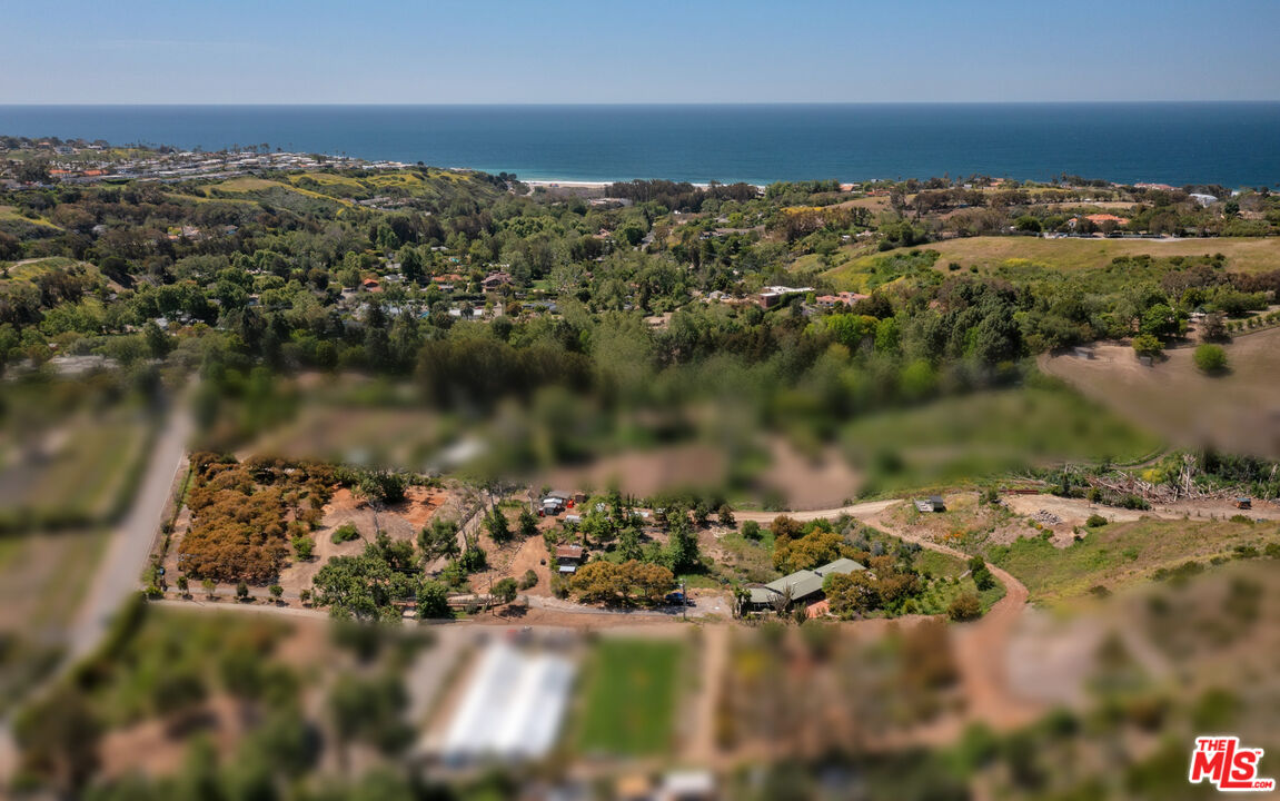 6009 Bonsall Drive Malibu, CA 90265 - Photo 3 of 49 an aerial view of a houses with ocean view