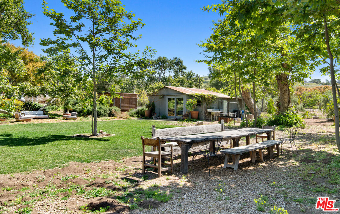 6009 Bonsall Drive Malibu, CA 90265 - Photo 37 of 49 a view of a house with backyard and sitting area