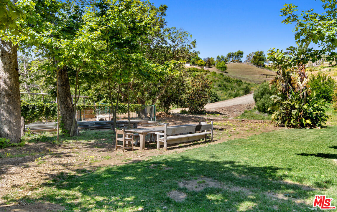 6009 Bonsall Drive Malibu, CA 90265 - Photo 38 of 49 a view of a house with a yard