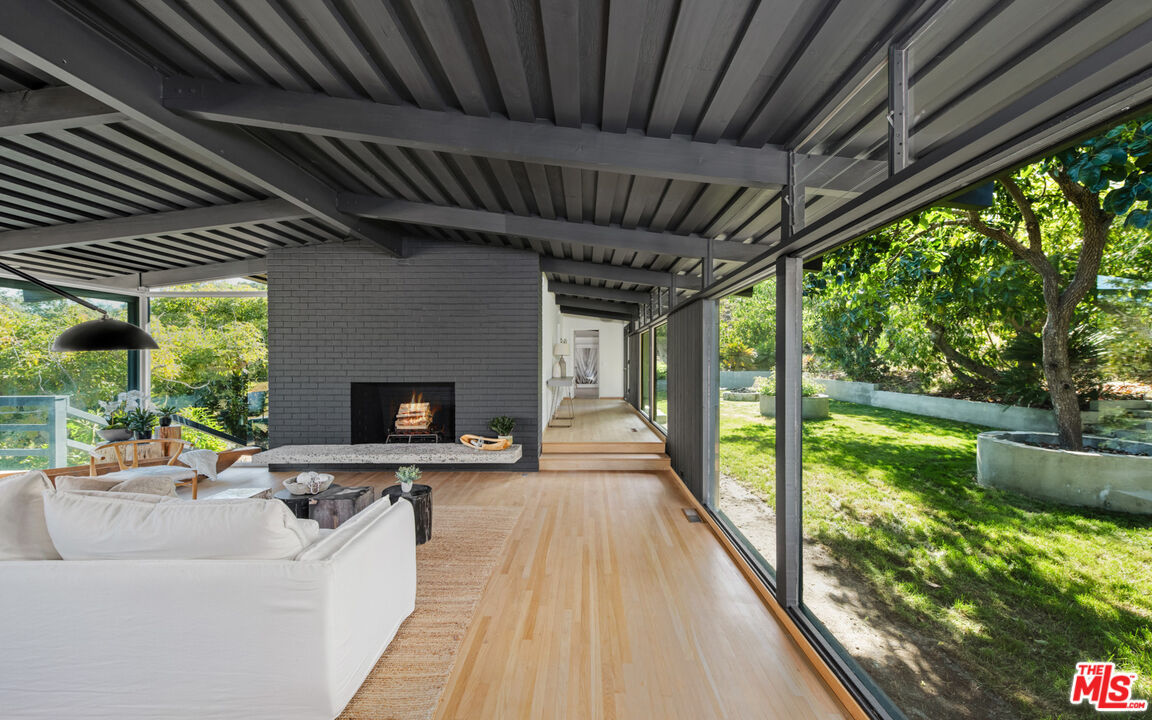 6009 Bonsall Drive Malibu, CA 90265 - Photo 7 of 49 a outdoor space with patio lots of furniture and garden view