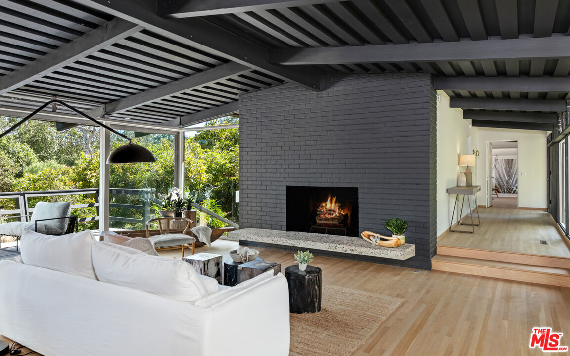 6009 Bonsall Drive Malibu, CA 90265 - Photo 8 of 49 a outdoor living space with patio furniture and a fireplace