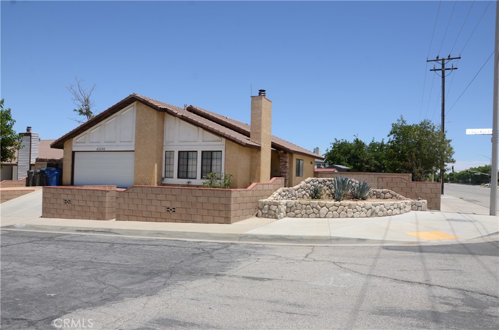 43600 Santa Rosa Circle Lancaster, CA 93535 - Photo 7 of 25 a view of a house with a patio