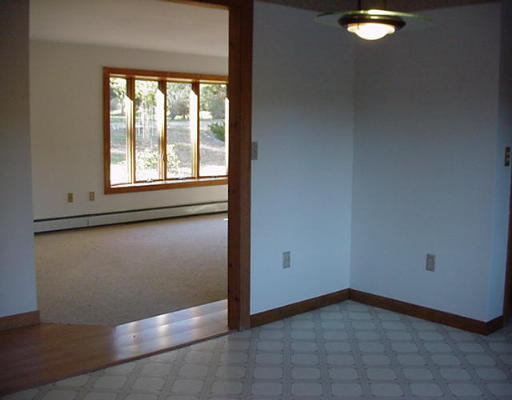 32 Sandy Cove Road Lunenburg, MA 01462 - Photo 4 of 5 a view of an empty room with a window