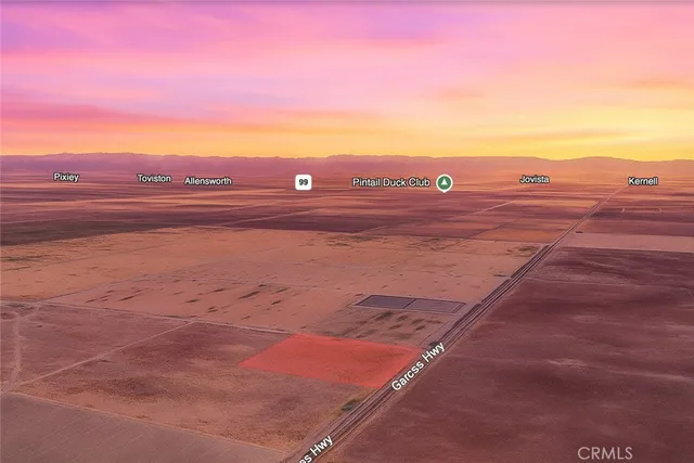 a view of a road with a bench