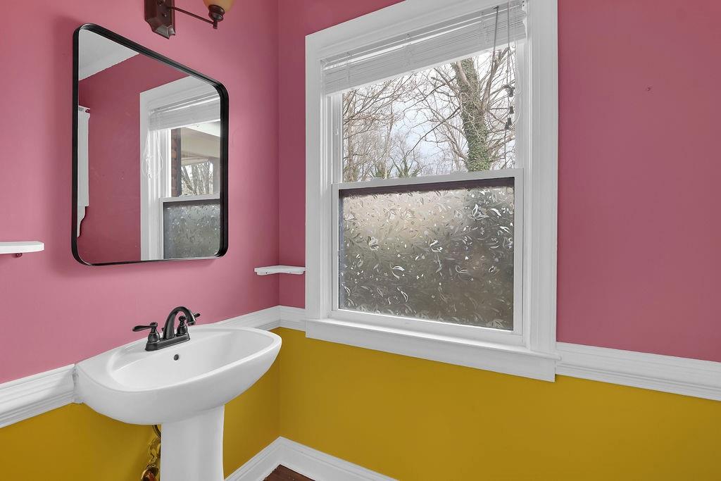 326 Fayette Drive Winder, GA 30680 - Photo 18 of 57 a bathroom with a sink and a mirror