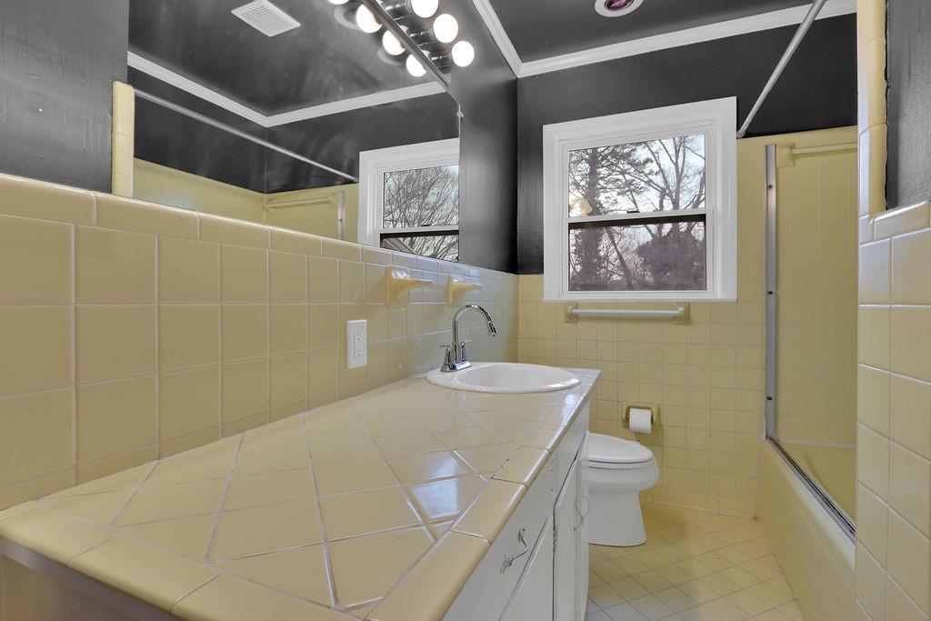 326 Fayette Drive Winder, GA 30680 - Photo 20 of 57 a bathroom with a sink a toilet and shower