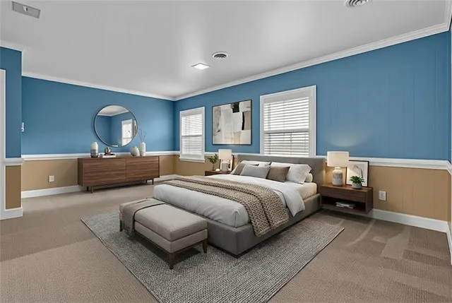 a spacious bedroom with a bed and window