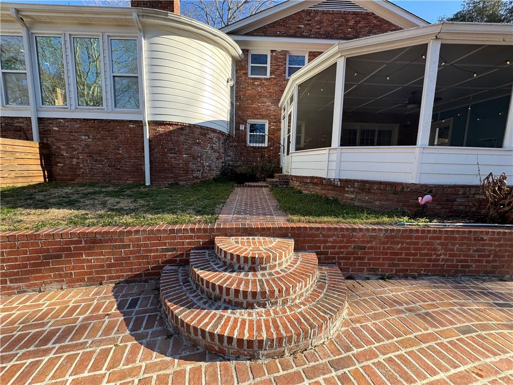 326 Fayette Drive Winder, GA 30680 - Photo 34 of 57 a front view of a house with a garden