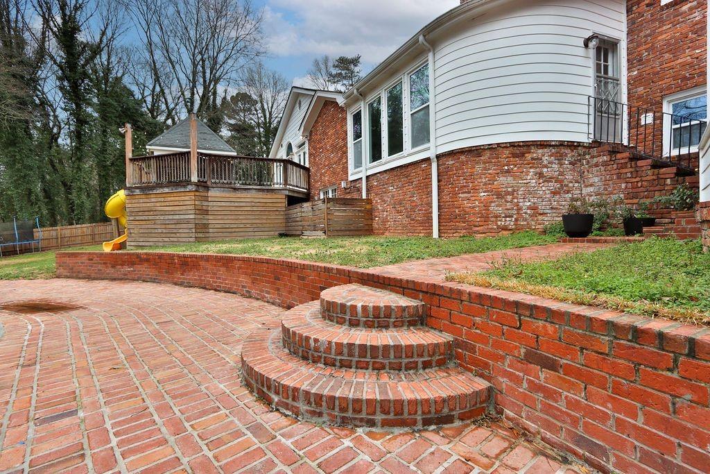 326 Fayette Drive Winder, GA 30680 - Photo 44 of 57 a front view of a house with a yard