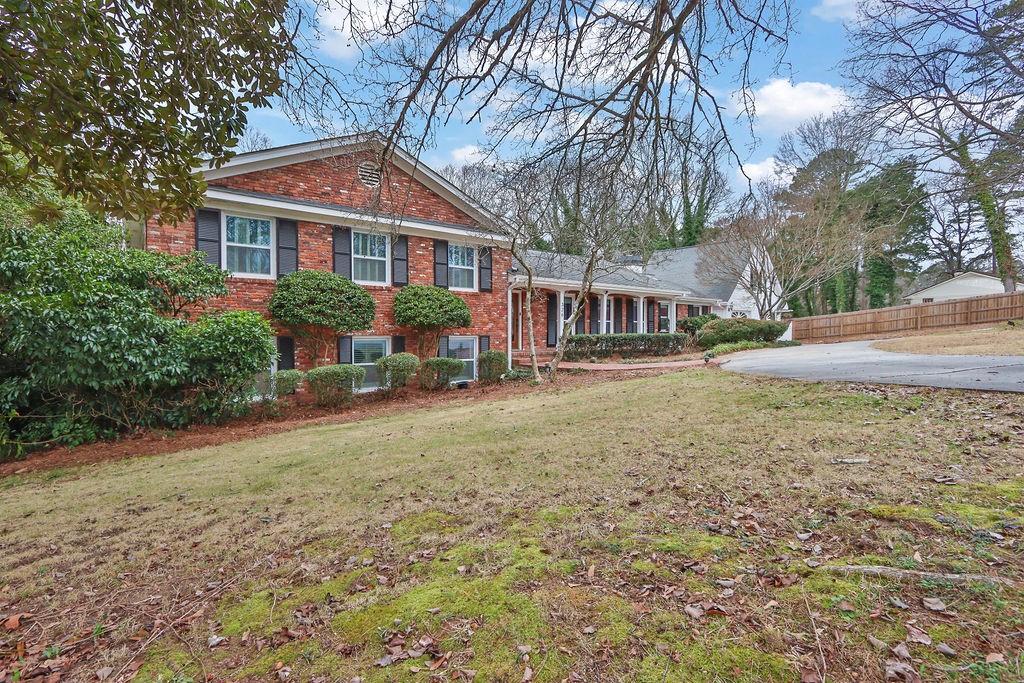 326 Fayette Drive Winder, GA 30680 - Photo 5 of 57 a front view of a house with garden