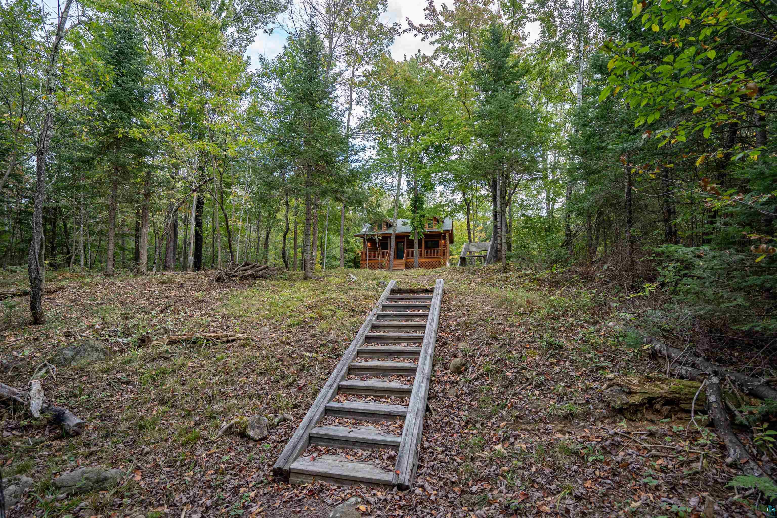 6711 South Jem Lane Lake Nebagamon, WI 54849 - Photo 20 of 28 View of yard