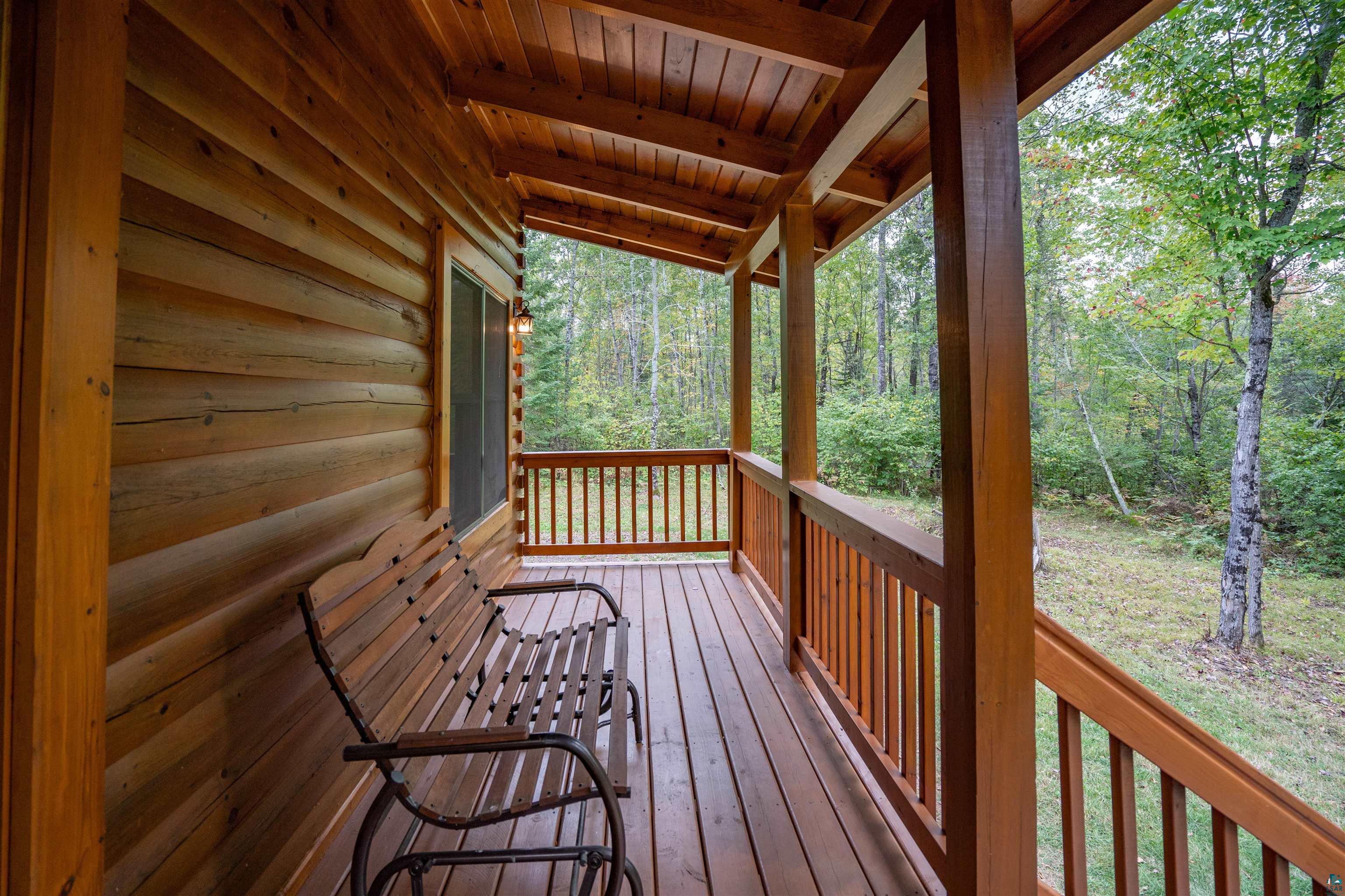 6711 South Jem Lane Lake Nebagamon, WI 54849 - Photo 5 of 28 View of wooden terrace