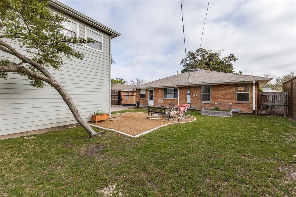 7128 Haverford Road Dallas, TX 75214 - Photo 20 of 24 a front view of a house with yard porch and furniture