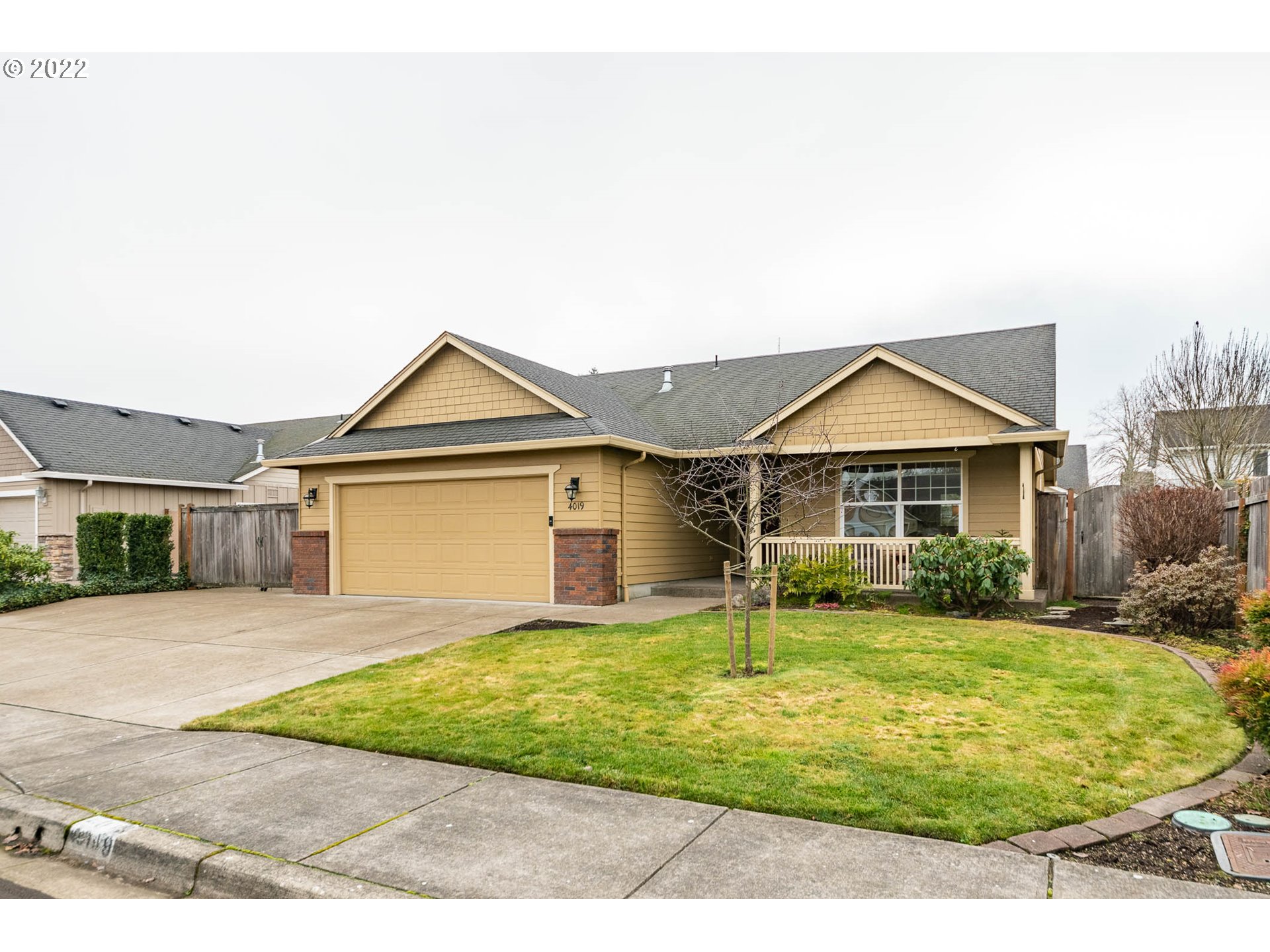 4019 Douglas Drive Springfield, OR 97478 - Photo 1 of 32 a view of a house with a yard and potted plants