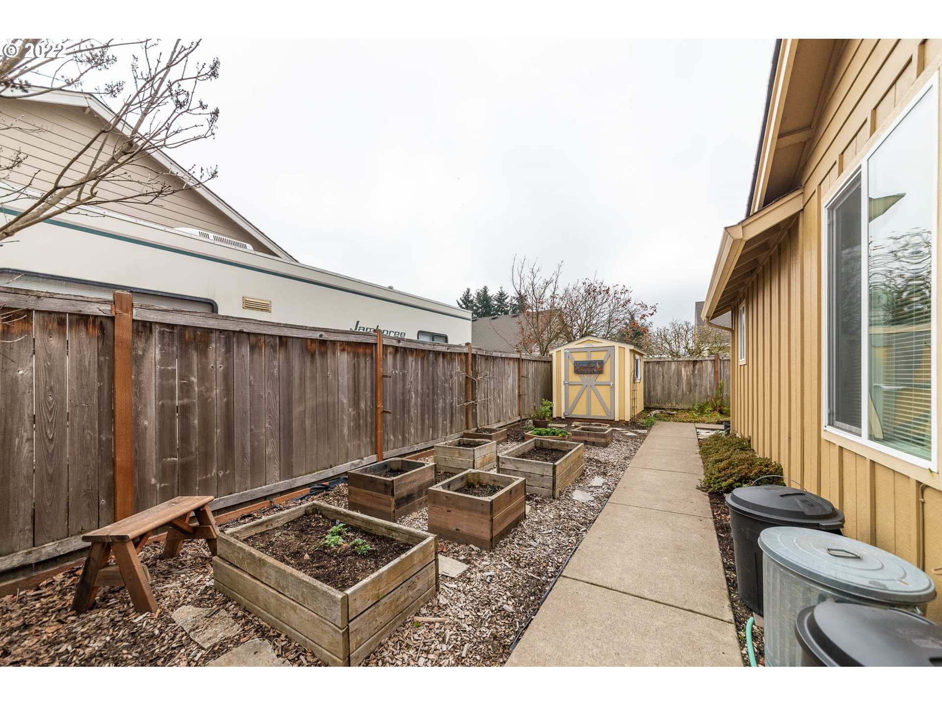 4019 Douglas Drive Springfield, OR 97478 - Photo 26 of 32 a backyard of a house with table and chairs