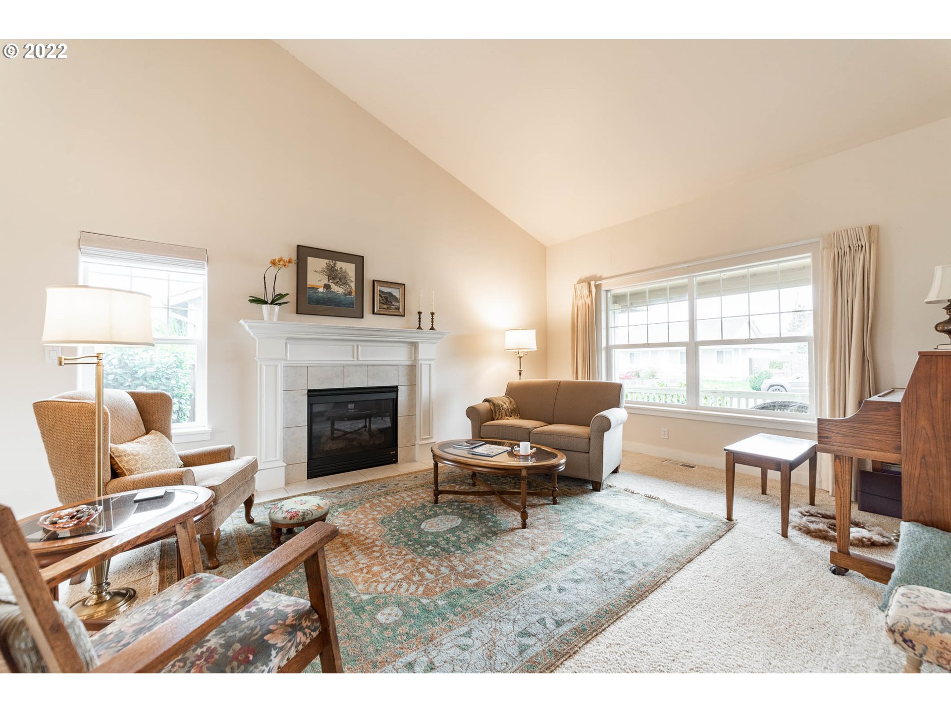 4019 Douglas Drive Springfield, OR 97478 - Photo 5 of 32 a living room with furniture a fireplace and a large window