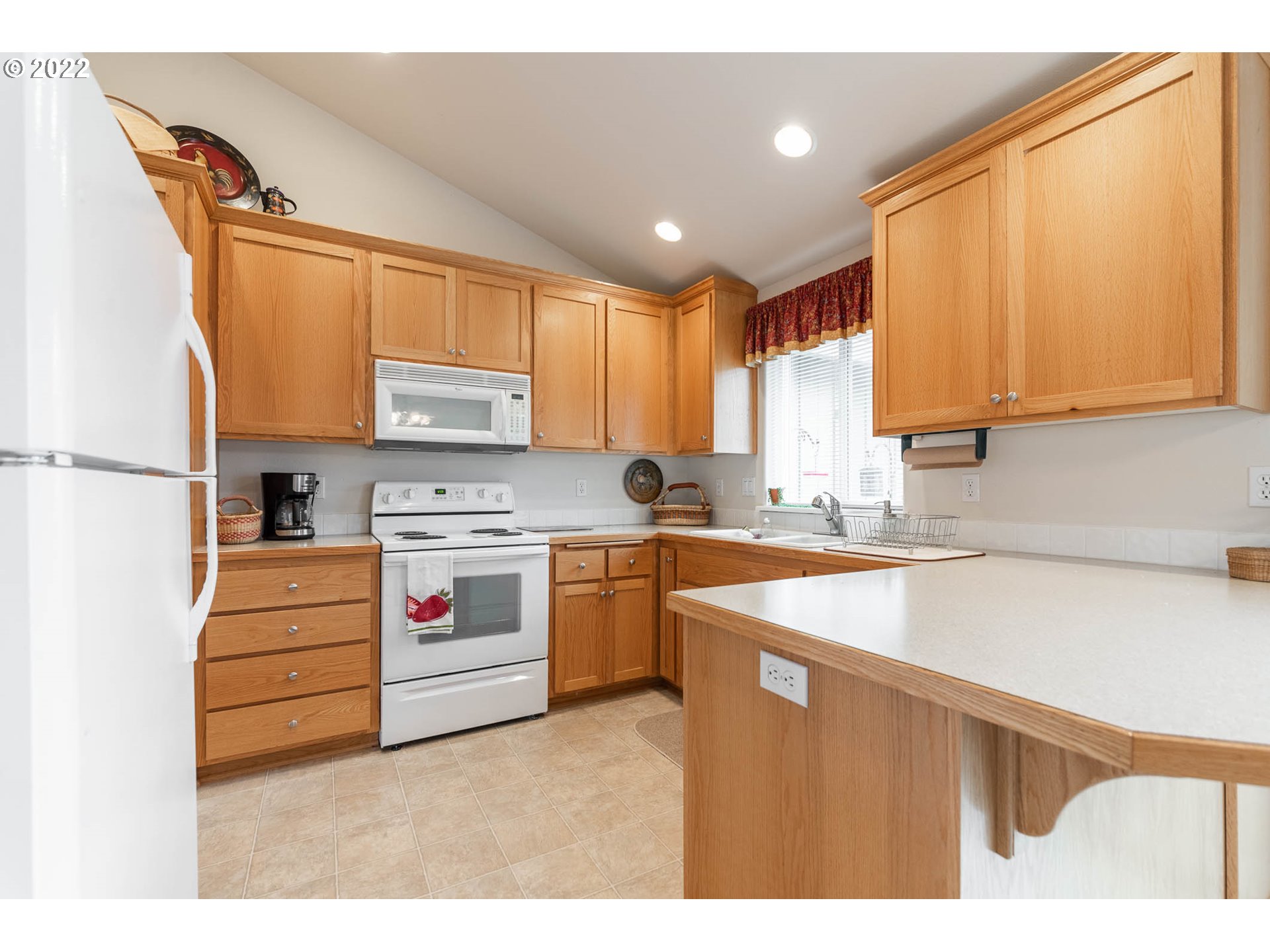 4019 Douglas Drive Springfield, OR 97478 - Photo 8 of 32 a kitchen with stainless steel appliances granite countertop a sink and cabinets