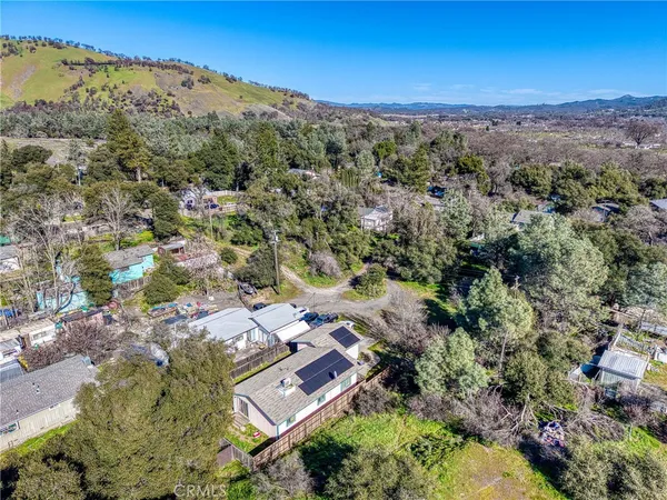 an aerial view of residential house with outdoor space