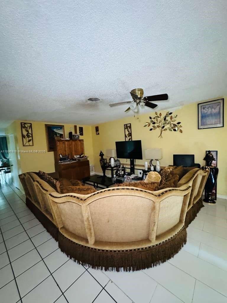 3405 Northwest 82nd Avenue Coral Springs, FL 33065 - Photo 21 of 26 a living room with furniture