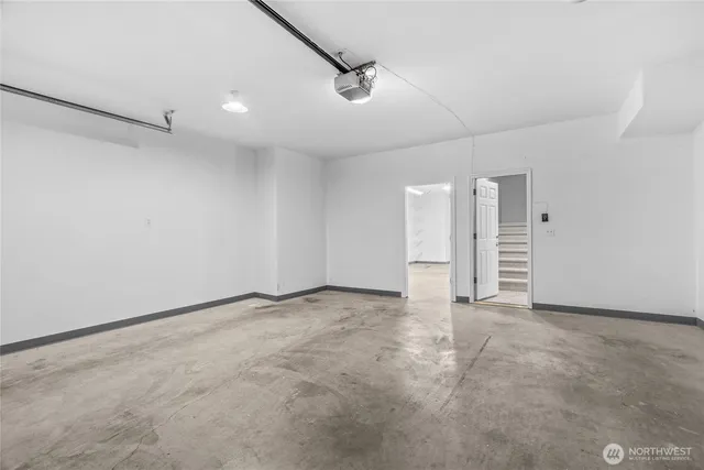 a balcony with furniture and wooden floor