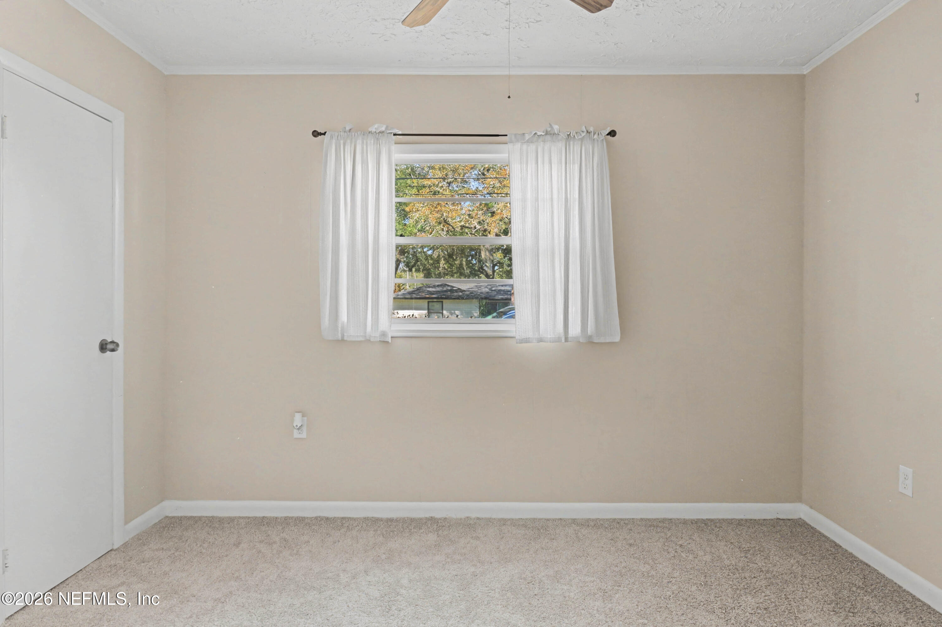 215 Orchis Road St. Augustine, FL 32086 - Photo 20 of 51 an empty room with a window