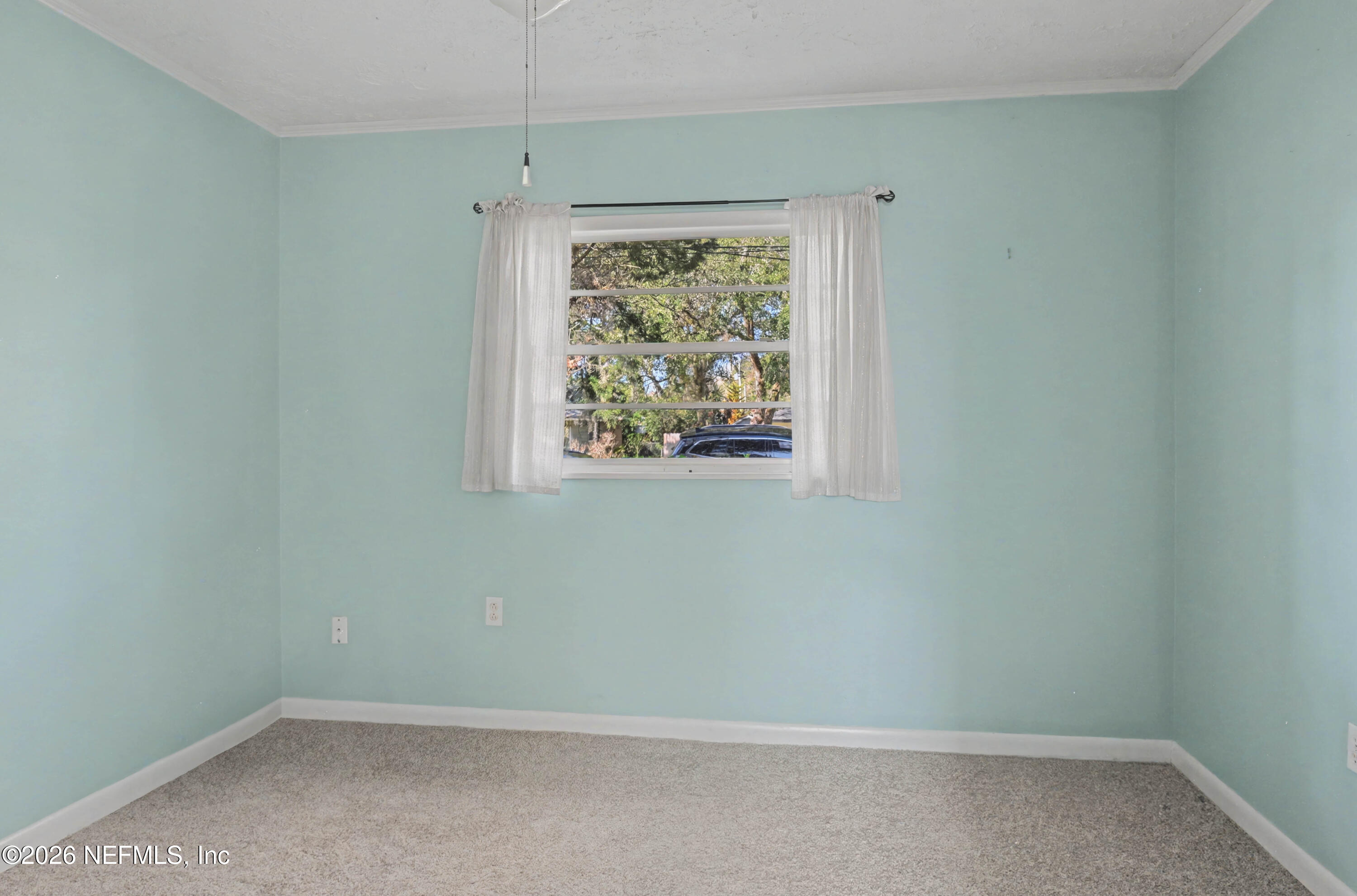 215 Orchis Road St. Augustine, FL 32086 - Photo 24 of 51 an empty room with a window