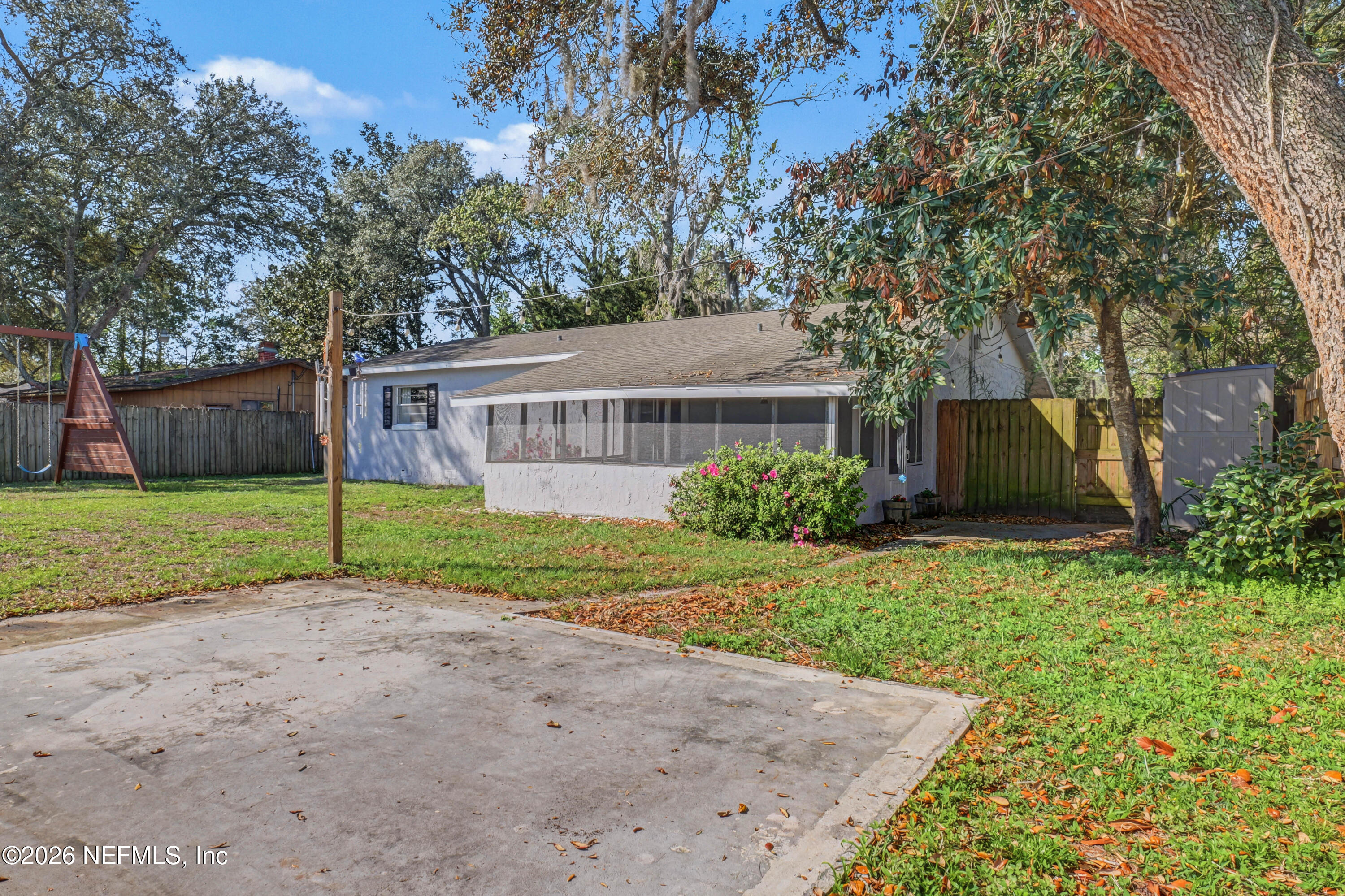 215 Orchis Road St. Augustine, FL 32086 - Photo 3 of 51 a view of a house with backyard and garden