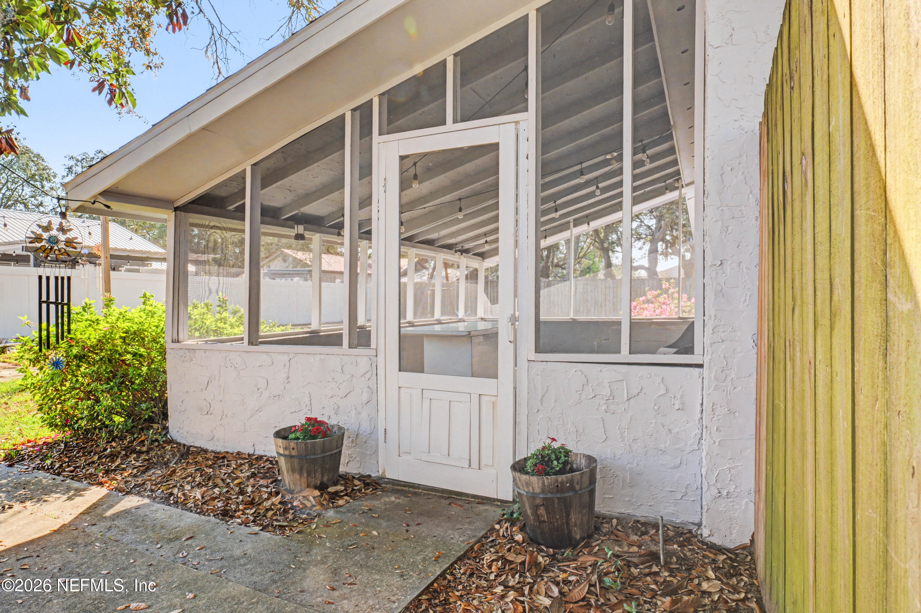 215 Orchis Road St. Augustine, FL 32086 - Photo 31 of 51 a stairs and a chair
