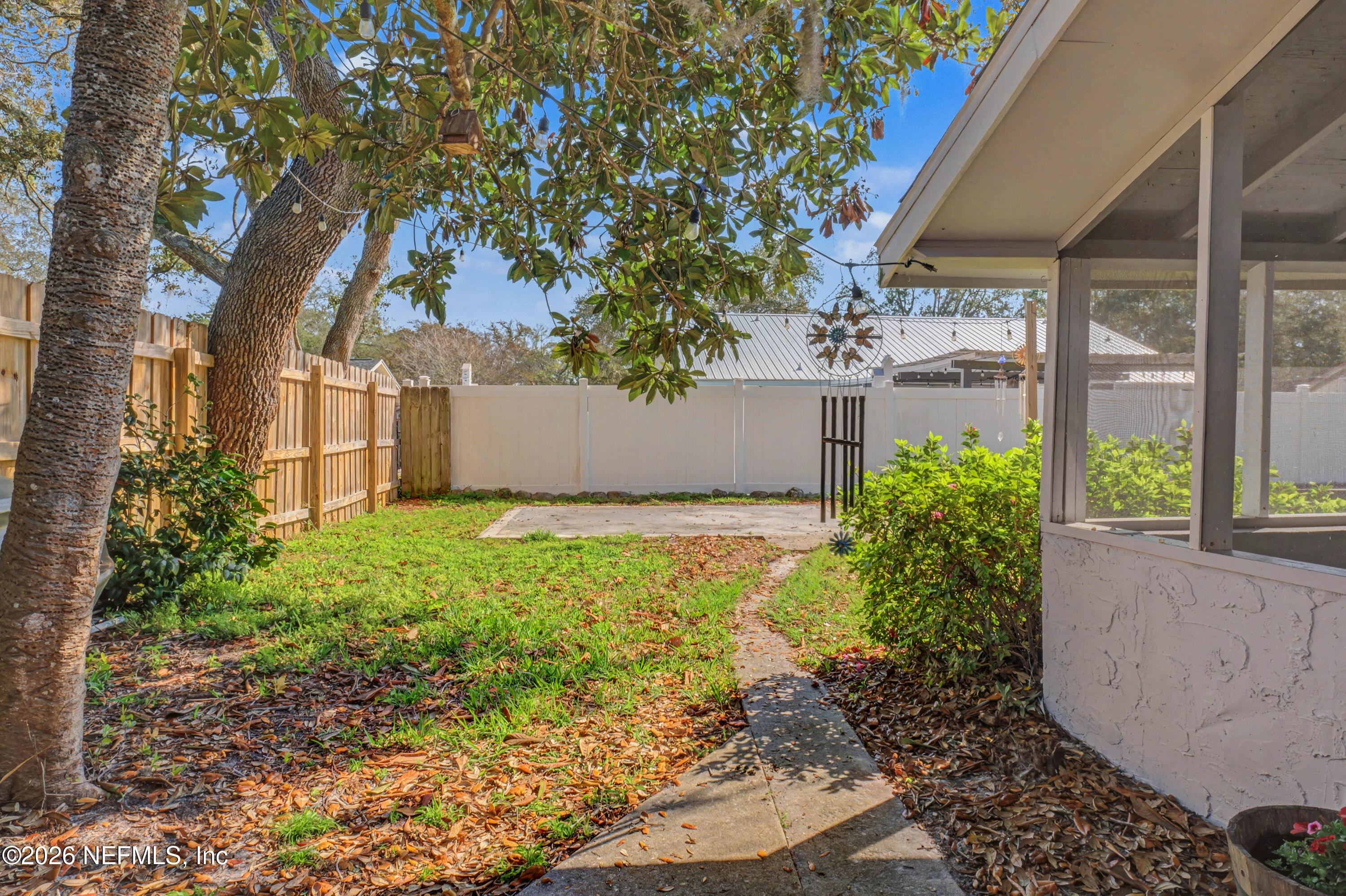 215 Orchis Road St. Augustine, FL 32086 - Photo 32 of 51 a view of a garden with plants