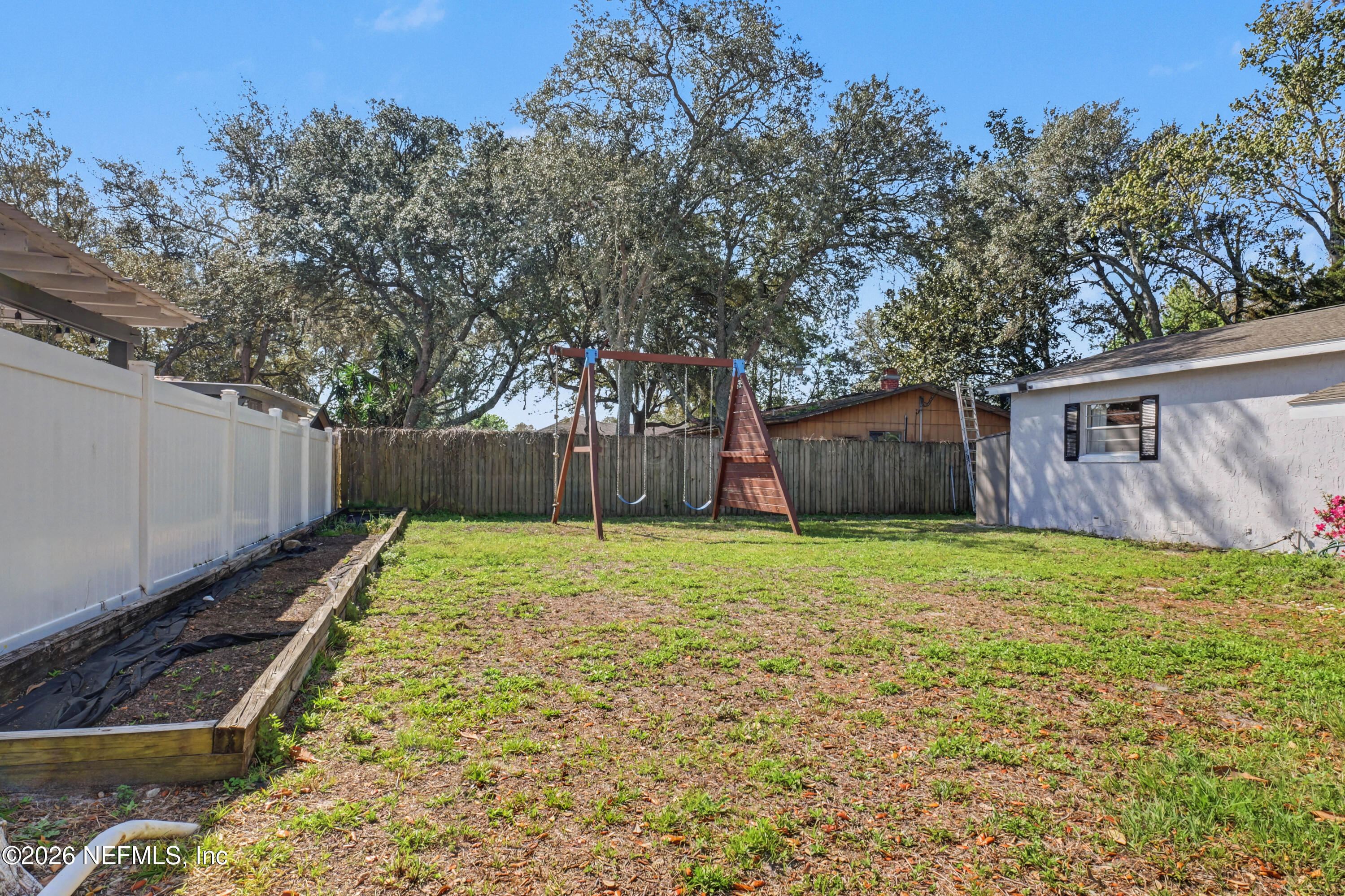 215 Orchis Road St. Augustine, FL 32086 - Photo 35 of 51 a backyard of a house