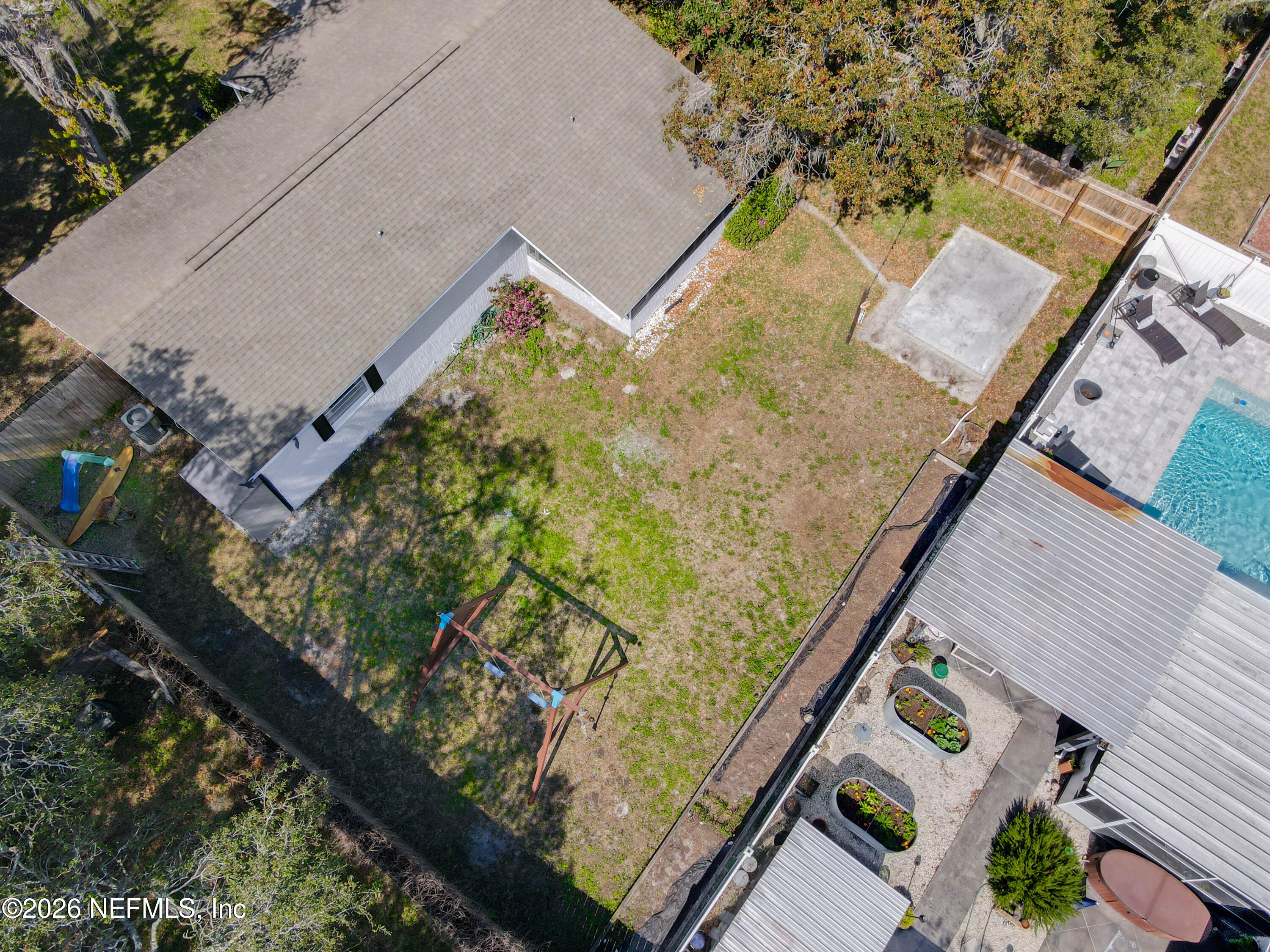 215 Orchis Road St. Augustine, FL 32086 - Photo 38 of 51 an aerial view of a house having a yard