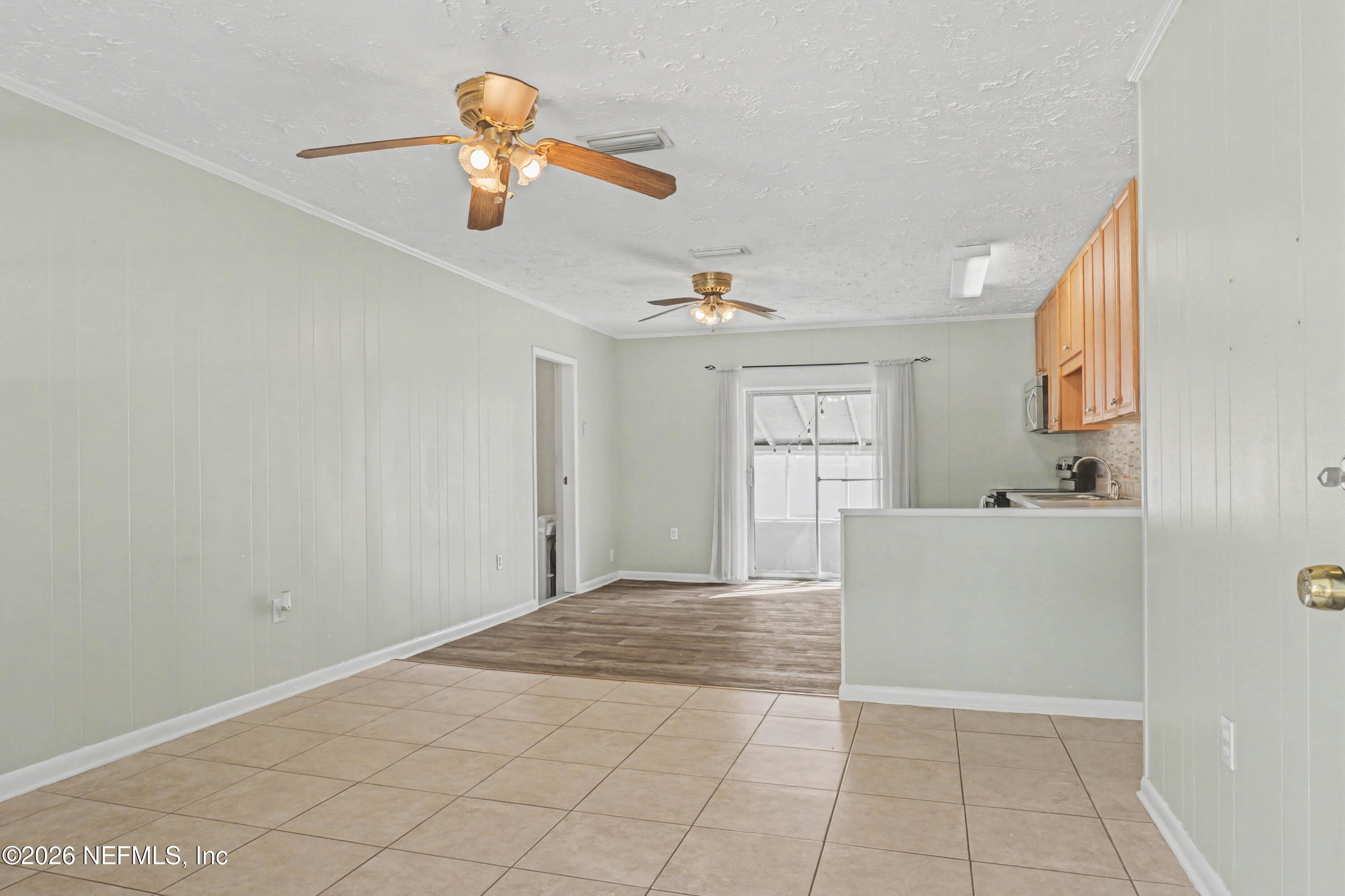 215 Orchis Road St. Augustine, FL 32086 - Photo 4 of 51 a view of a living room and bathroom