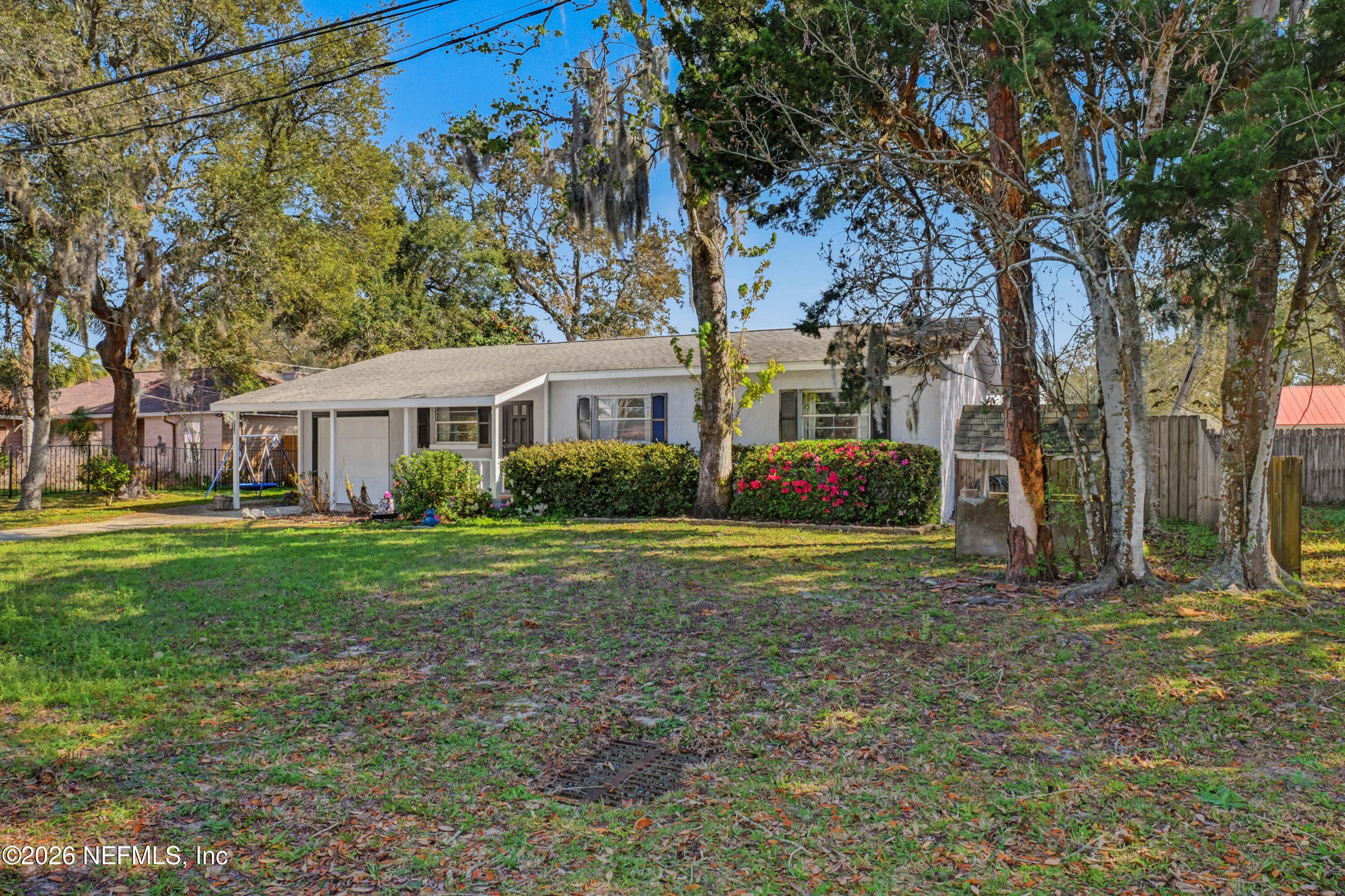 215 Orchis Road St. Augustine, FL 32086 - Photo 42 of 51 a house view with a garden space