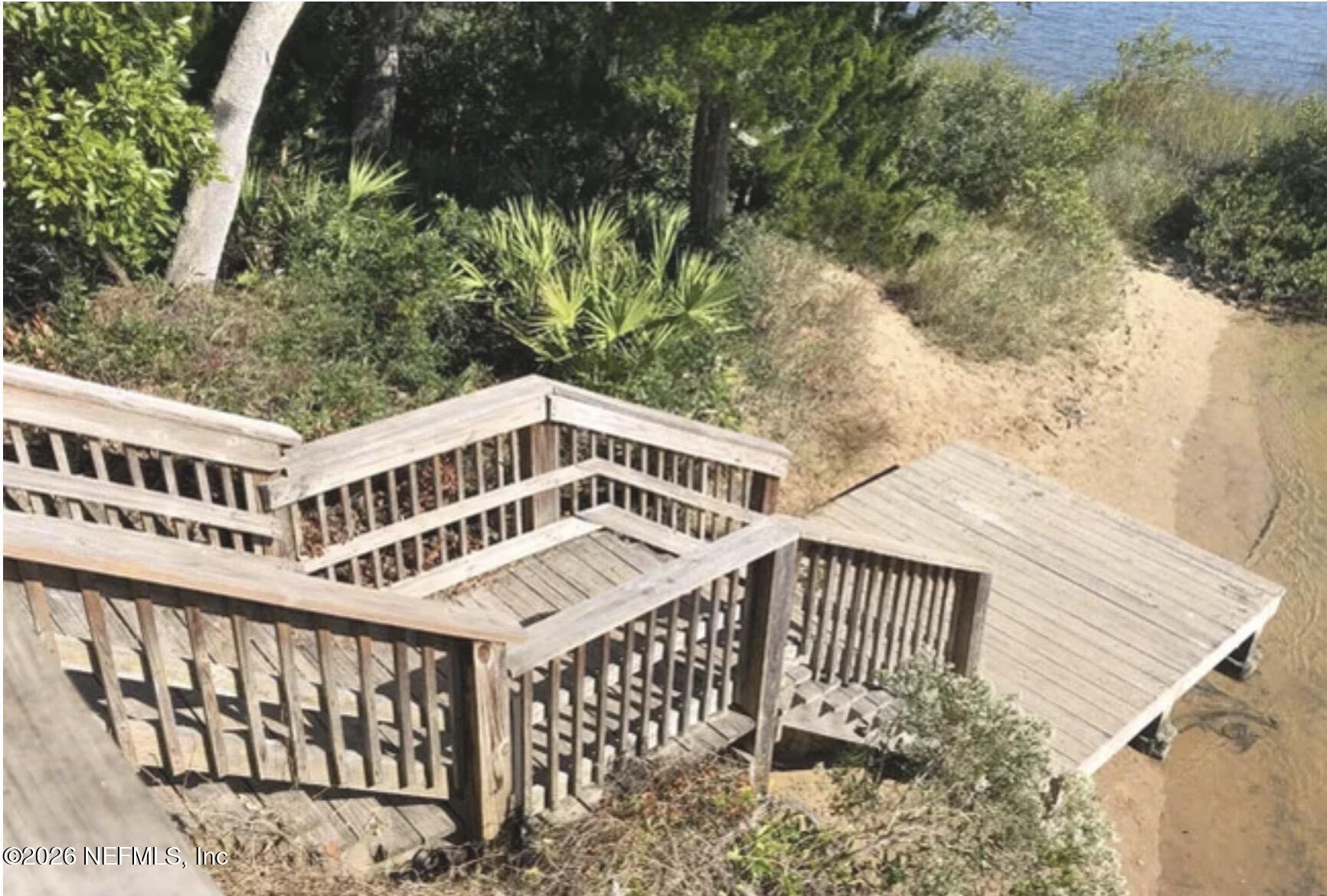 215 Orchis Road St. Augustine, FL 32086 - Photo 48 of 51 a front view of a house with a yard