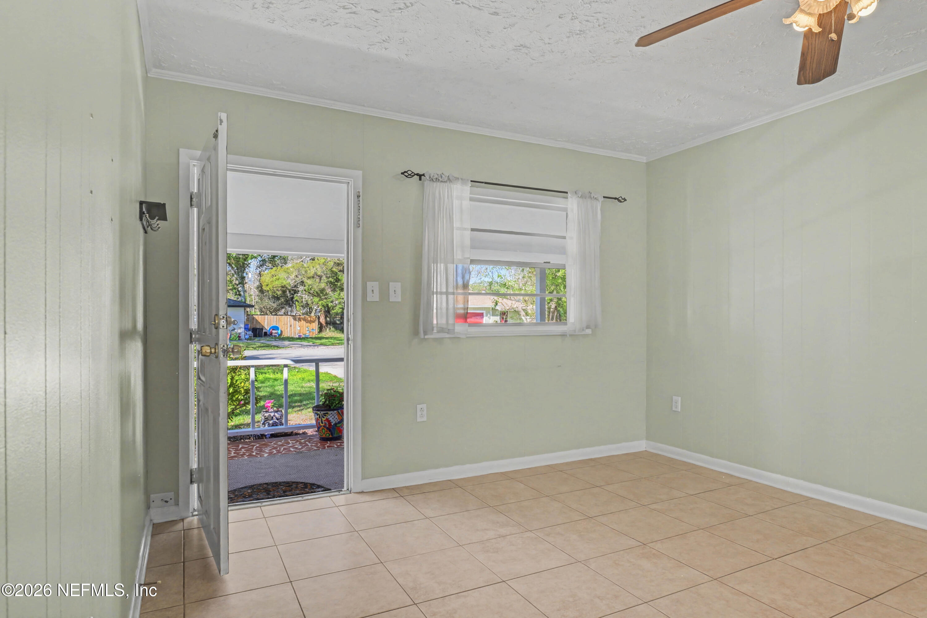 215 Orchis Road St. Augustine, FL 32086 - Photo 5 of 51 a view of an empty room and a window