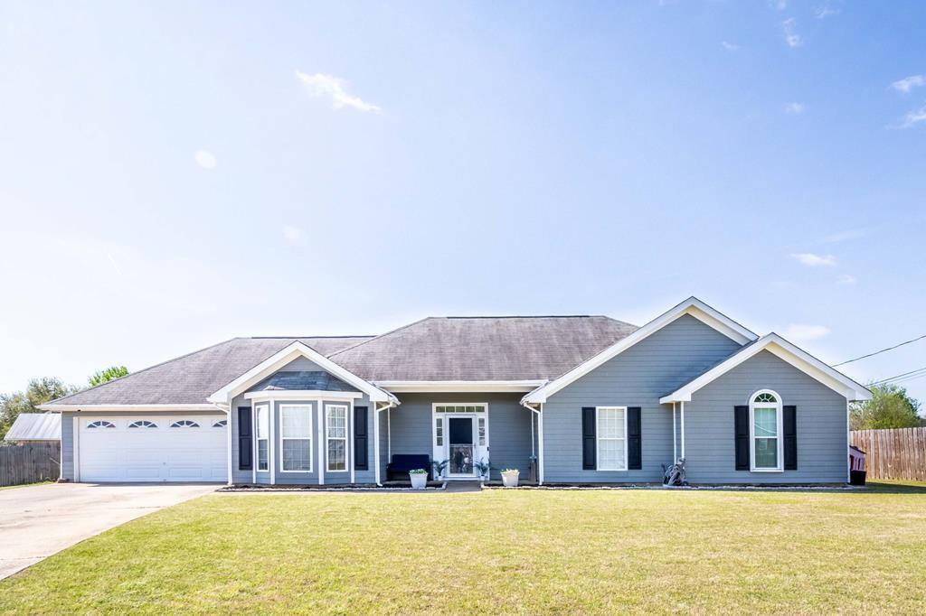 28 Whippoorwill Lane Fort Mitchell, AL 36856 - Photo 1 of 19 a front view of a house with a yard