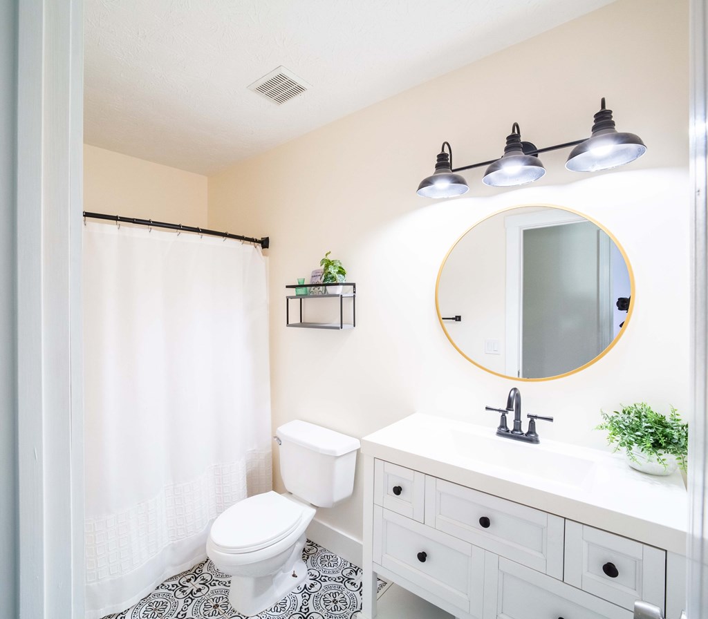 28 Whippoorwill Lane Fort Mitchell, AL 36856 - Photo 13 of 19 a bathroom with a sink and a mirror