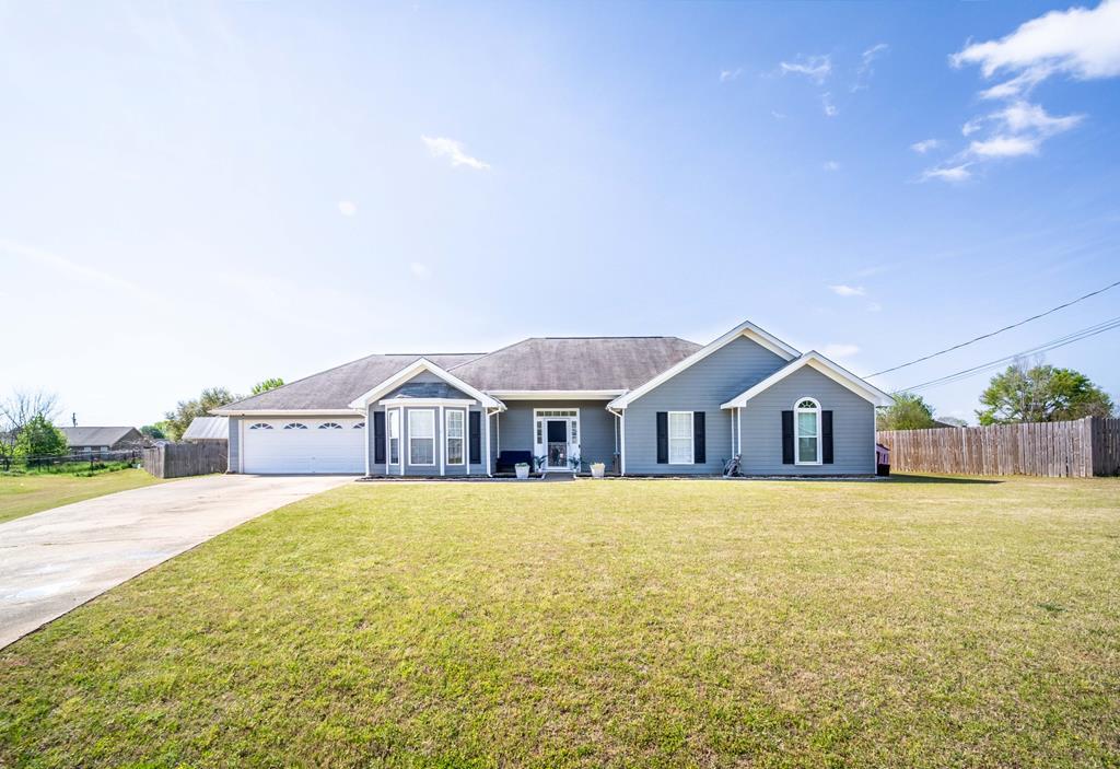 28 Whippoorwill Lane Fort Mitchell, AL 36856 - Photo 2 of 19 a view of a house with a big yard and large trees