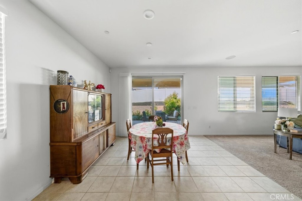 12766 Blush Court Riverside, CA 92503 - Photo 14 of 55 a dining room with furniture and window