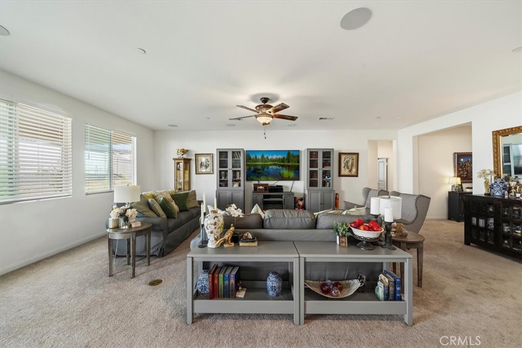 12766 Blush Court Riverside, CA 92503 - Photo 15 of 55 a living room with furniture and a large window