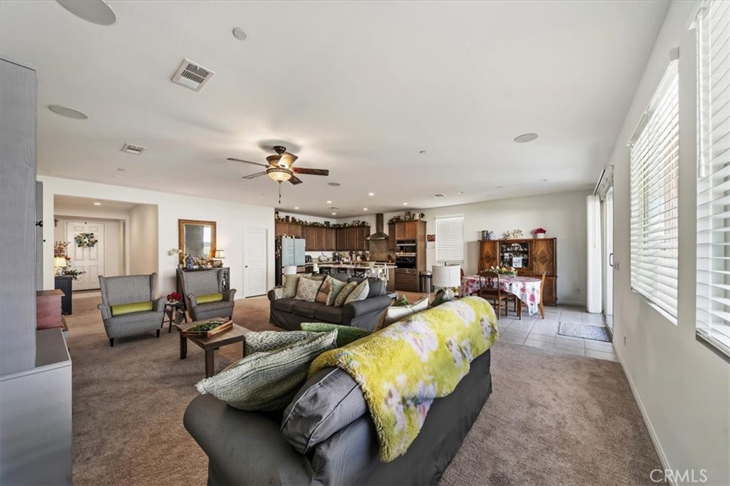 12766 Blush Court Riverside, CA 92503 - Photo 18 of 55 a living room with furniture and a large window