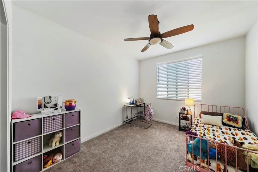 12766 Blush Court Riverside, CA 92503 - Photo 29 of 55 a bedroom with furniture and a window