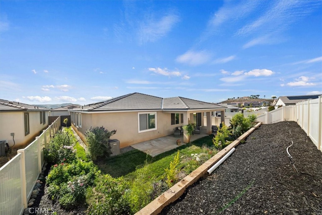 12766 Blush Court Riverside, CA 92503 - Photo 42 of 55 a front view of a house with a yard